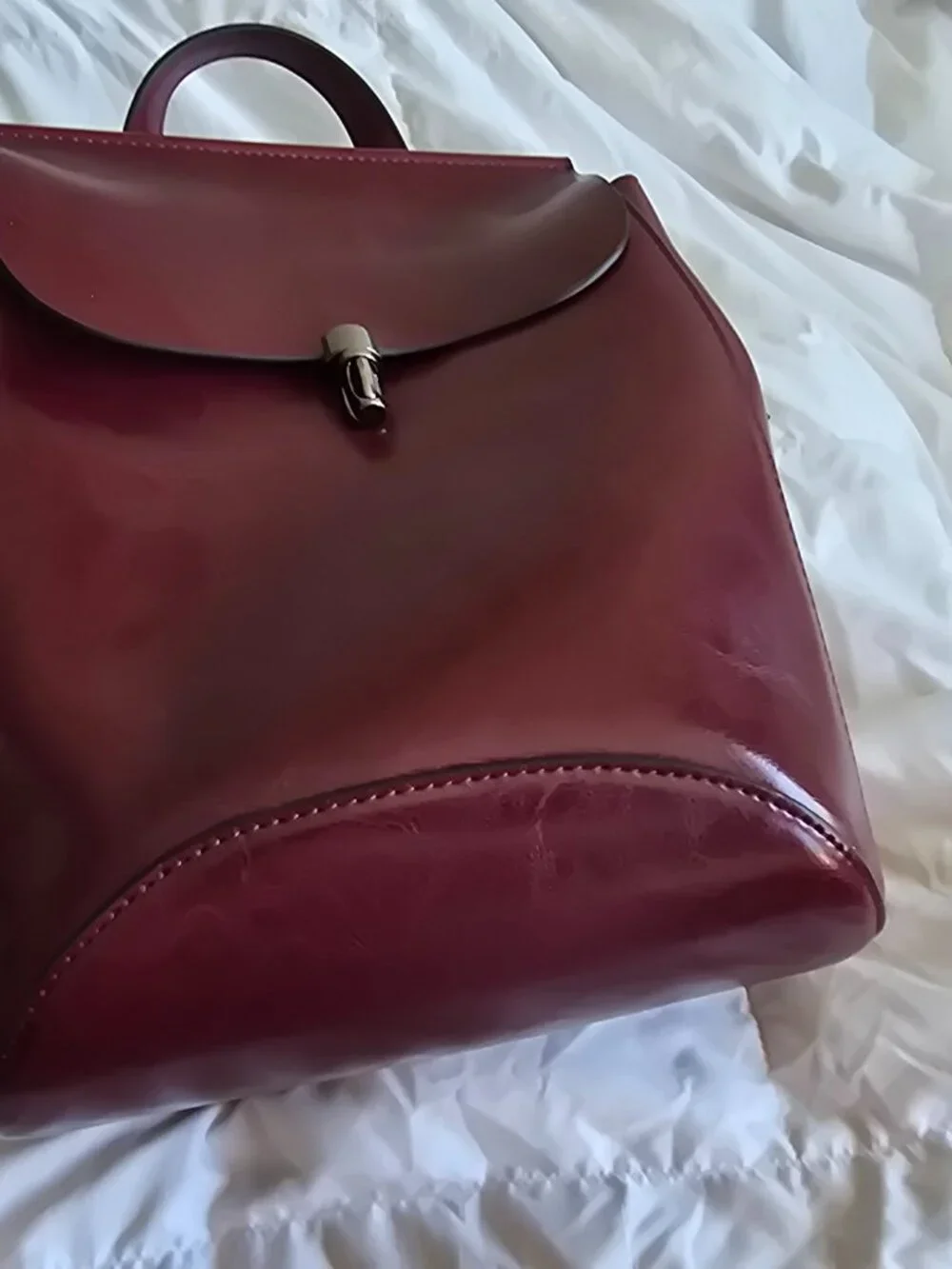 B designer cranberry red backpack bag independent leather